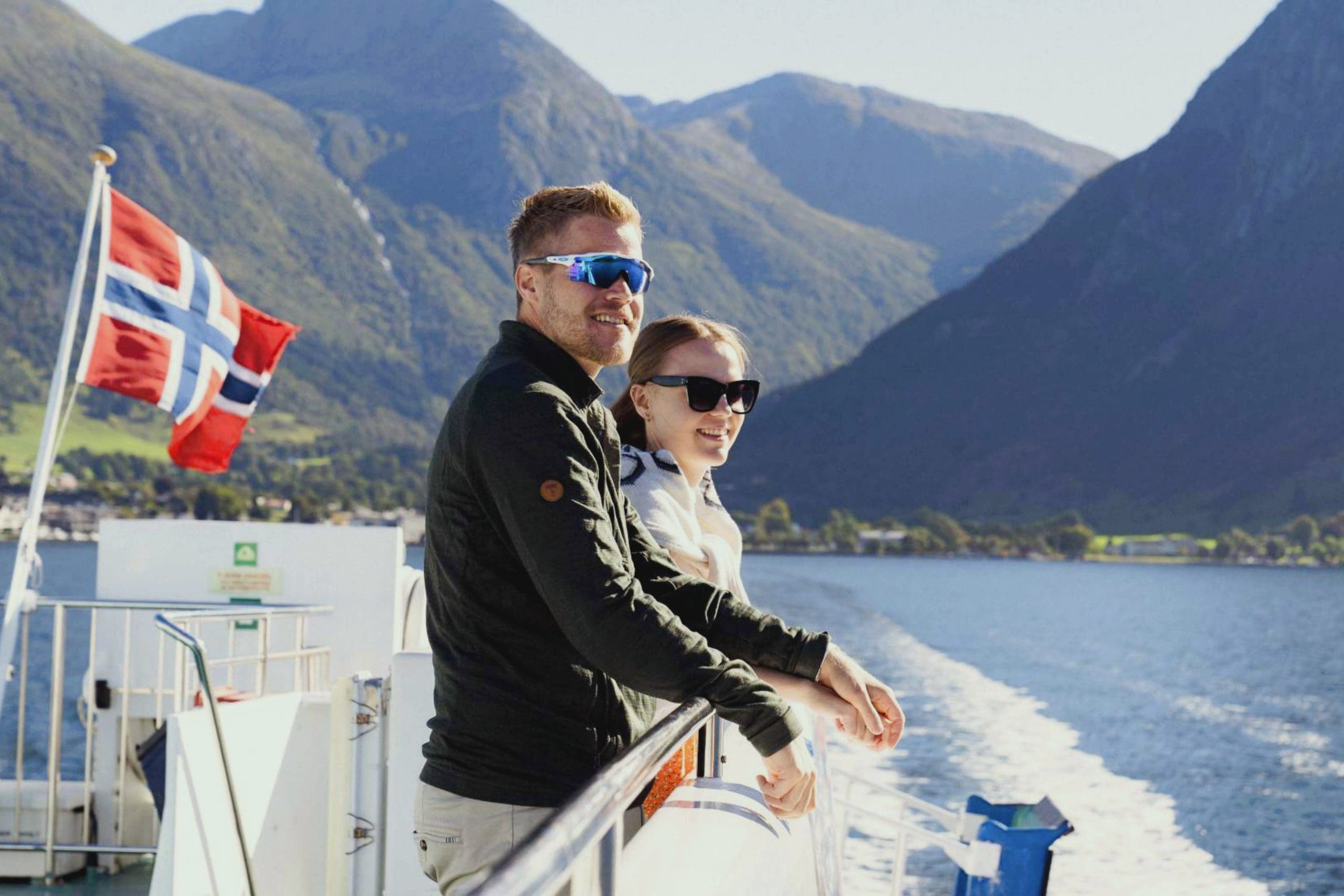 Photo of a man and a woman on a fjord cruice